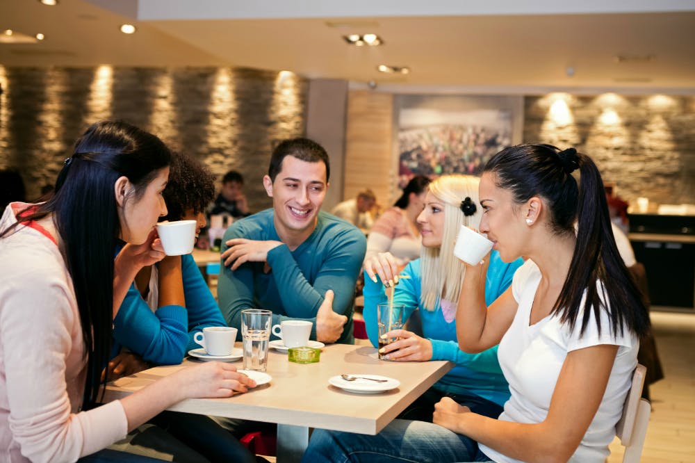 students in restaurant Portugal.png
